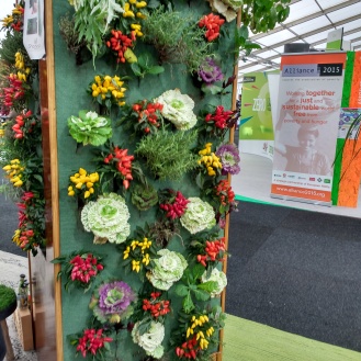While there were indeed cases highlighted by media of "false solutions" and "greenwashing" at COP21, the CGA showcased many ideas (such as this food wall) which are practical and feasible for citizens to use today. Other highlights included attractive, sturdy furniture built from waste materials ("upcycled") and new innovations in land/air/sea monitoring using autonomous/semi-autonomous machines, powered independently for long-range and low-emission data collection.